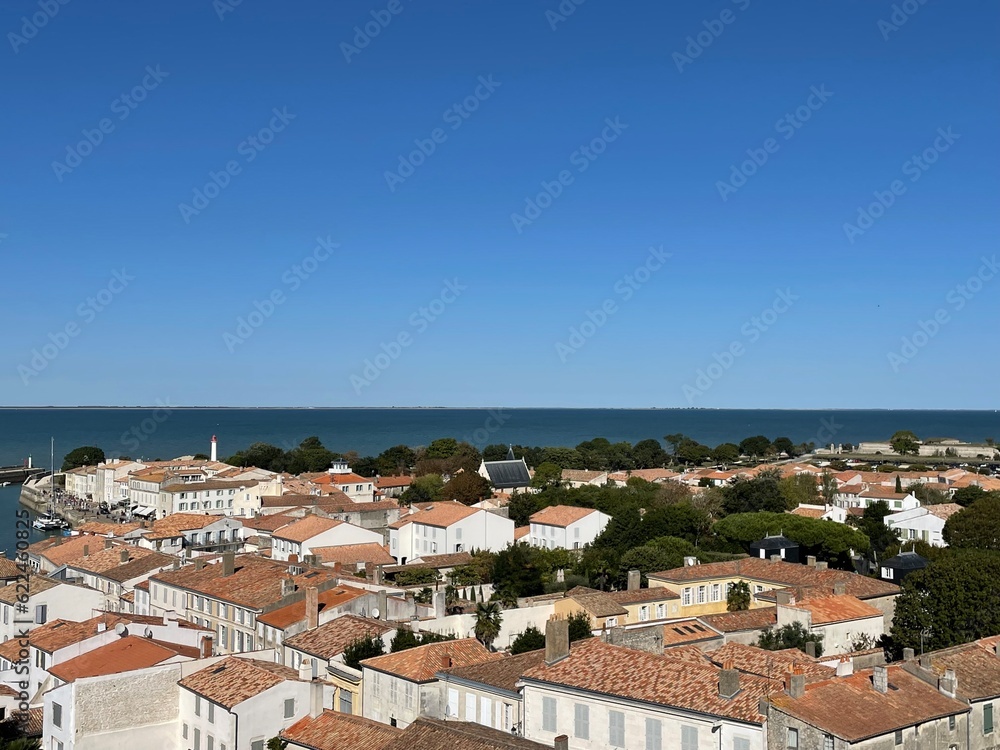 panorama from the many roofs of private houses in the city of the island of El Dore France on a summer day