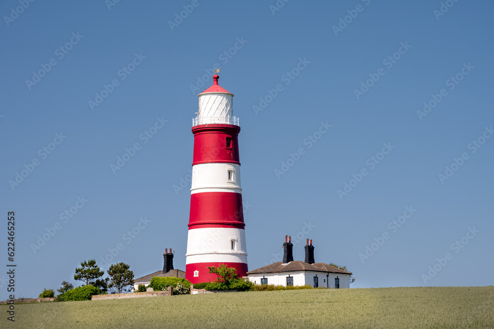 View of Happisburgh lighthouse on a spring afternoon, North Norfolk, England