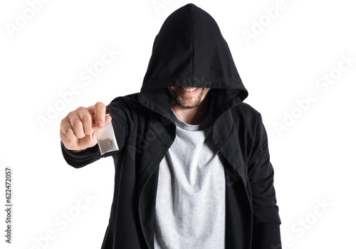 Male junkie with drugs on white background