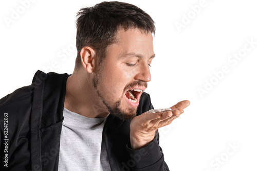Male drug addict with pills...