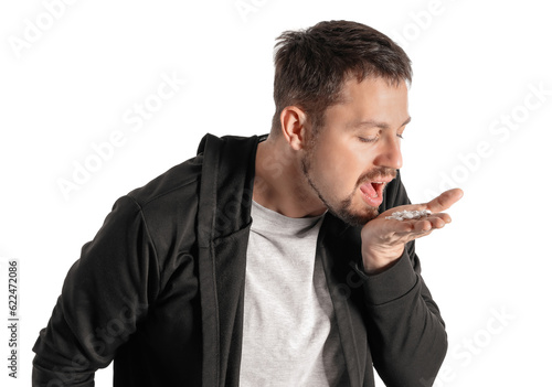 Male drug addict with pills...