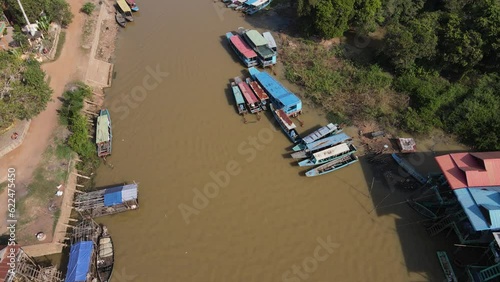 Floating village on a river, Kampong Phluk, Cambodia, Boats, fisherman, 4k Drone footage