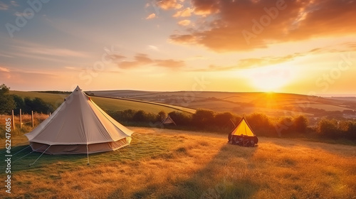 Glamping is luxurious glamorous camping. Glamping in a beautiful countryside at sunset. Generative AI