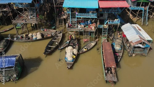 Floating village on a river, Kampong Phluk, Cambodia, Boats, fisherman, 4k Drone footage