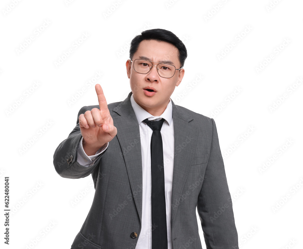 Angry businessman in suit posing on white background Angry businessman in suit posing on white background