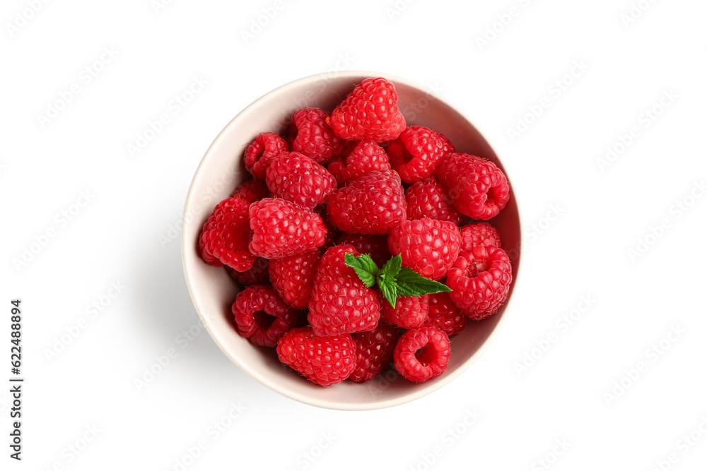 Bowl with fresh raspberries and mint on white background Bowl with fresh raspberries and mint on white background