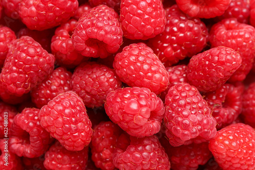 Texture of fresh raspberries as background
