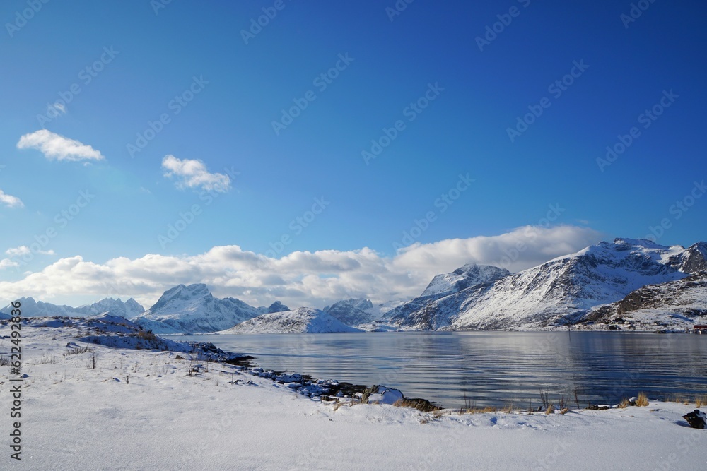 Snow mountain with lake in winter season at Norway, Europe. 