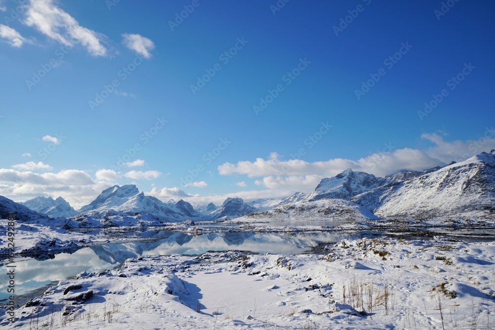 Obraz premium Snow mountain with lake in winter season at Norway, Europe. 