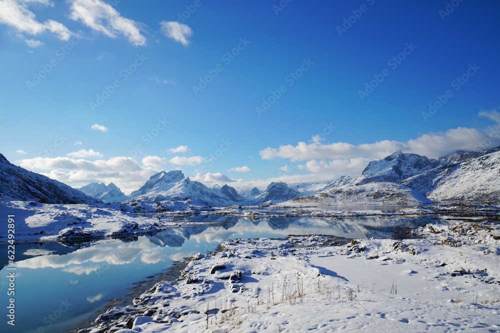 Snow mountain and lake in winter season at Norway, Europe. 