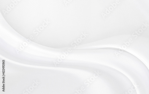 White gray satin texture that is white silver fabric silk background with beautiful soft blur pattern natural.