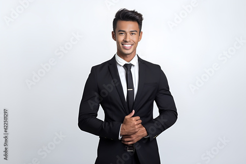 A handsome charming South East Asian Businessman, Malaysian, Indonesian in suit and tie