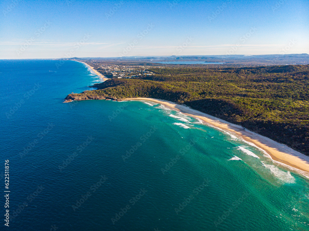 aerial panorama of beautiful alexandria bay in noosa national park with visible dangerous, deadly rip currents; unique national park with pristine beaches on the coast of pacific	