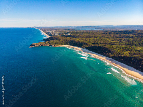 aerial panorama of beautiful alexandria bay in noosa national park with visible dangerous, deadly rip currents; unique national park with pristine beaches on the coast of pacific 