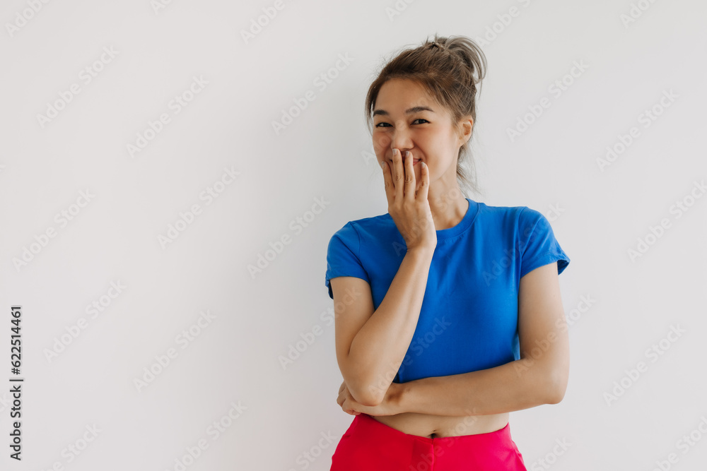 Happy asian woman in colorful clothes stand crossed arms isolated on white. Happy asian woman in colorful clothes stand crossed arms isolated on white.