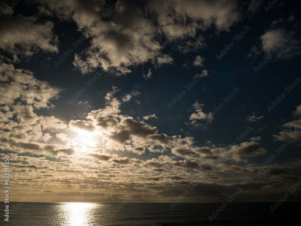 Clouds over sea. Morning seascape.