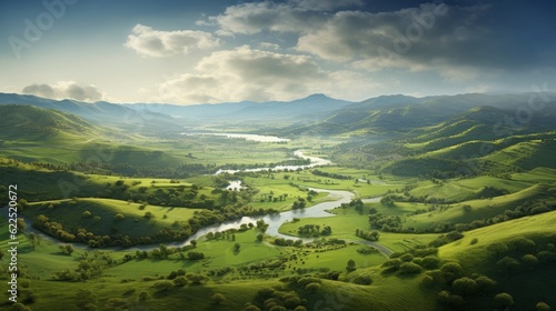 Aerial view of a valley with a river running through it © KerXing