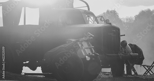 German Military Ammunition. German Vehicle Truck Opel Blitz And German Infantry Cart Or Handcart Infanteriekarren If8 Of World War Ww Ii. Black And White . German World War Ii Automotive.