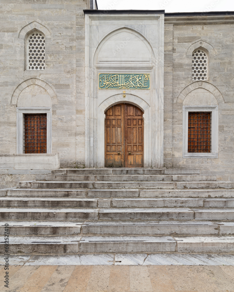 Fototapeta premium Closed Entrance of Yeni Valide I Mosque, or Yeni Valide Camii, an 18th century Ottoman mosque located in Uskudar district, on the Asian side of Istanbul, Istanbul, Turkey