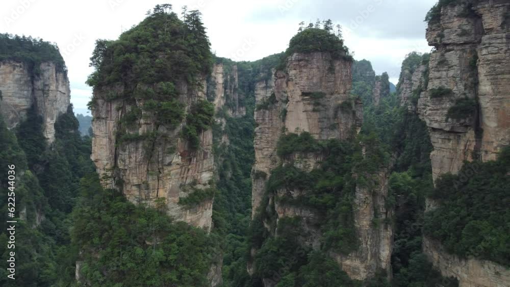 4K Aerial Parallax Of The Heavenly Pillars of Avatar Hallelujah Mountains; Zhangjiajie, Hunan Province Of China. 4K Aerial Parallax Of The Heavenly Pillars of Avatar Hallelujah Mountains; Zhangjiajie, Hunan Province Of China.