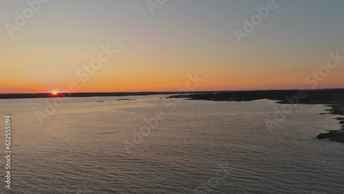 Sunset aerial view of coastal sea near Southport, Maine  photo