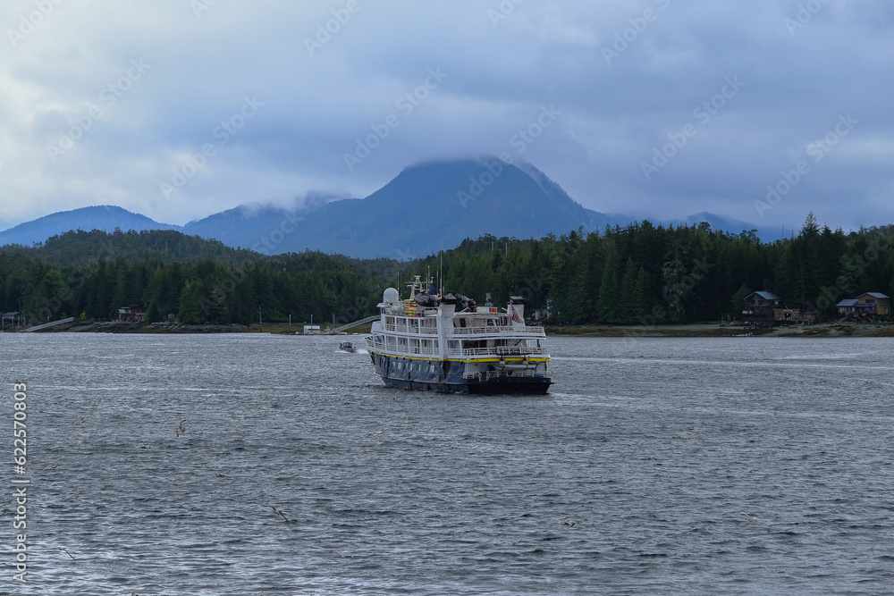 Expedition cruiseship cruise ship yacht liner Sea Bird in Ketchikan, Alaska with breathtaking wilderness landscape nature scenery and other vessels