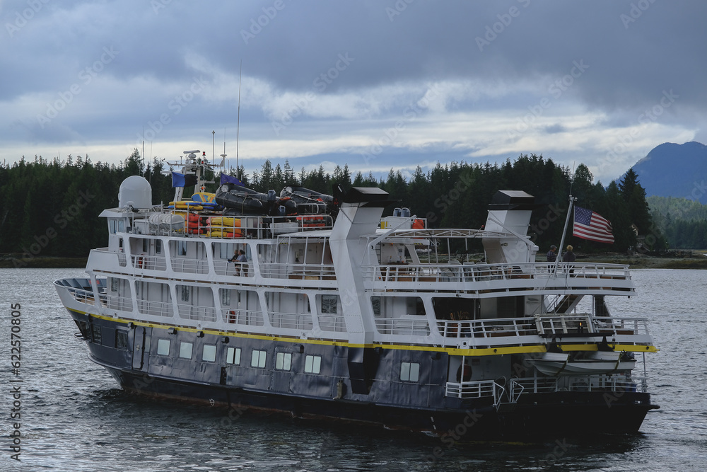 Expedition cruiseship cruise ship yacht liner Sea Bird in Ketchikan, Alaska with breathtaking wilderness landscape nature scenery and other vessels Expedition cruiseship cruise ship yacht liner Sea Bird in Ketchikan, Alaska with breathtaking wilderness landscape nature scenery and other vessels
