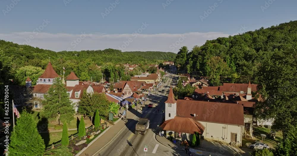 Helen Georgia Aerial v8 cinematic low drone flyover small mountain town along the main street capturing charming Bavarian-style architectures and lush greenery - Shot with Mavic 3 Cine - October 2022 Helen Georgia Aerial v8 cinematic low drone flyover small mountain town along the main street capturing charming Bavarian-style architectures and lush greenery - Shot with Mavic 3 Cine - October 2022