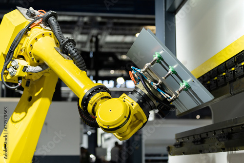 robot arm working in factory