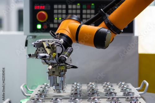 robot arm working in factory