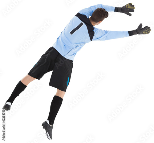 Digital png photo of caucasian male goalkeeper catching ball on transparent background