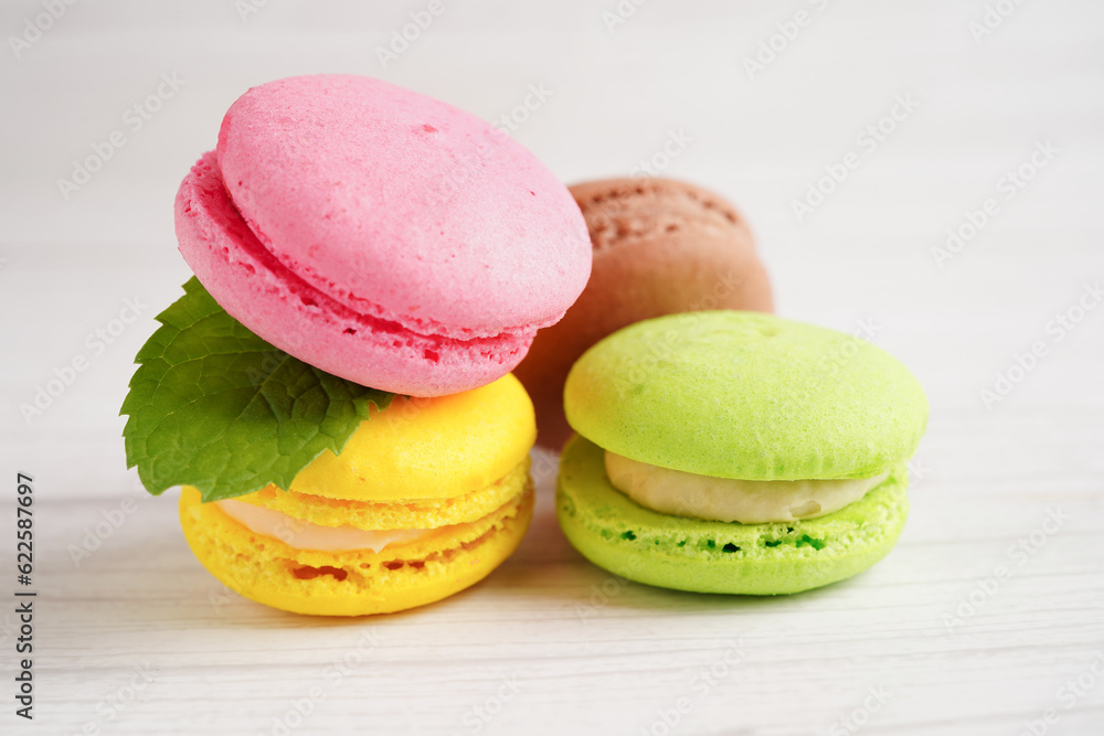 Macaron or french macaroon dessert, cake and cookies on the celebrated birthday. Macaron or french macaroon dessert, cake and cookies on the celebrated birthday.