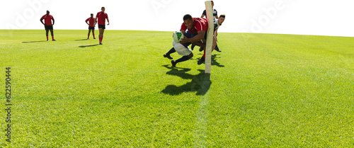 Digital png photo of diverse male rugby players playing at stadium on transparent background
