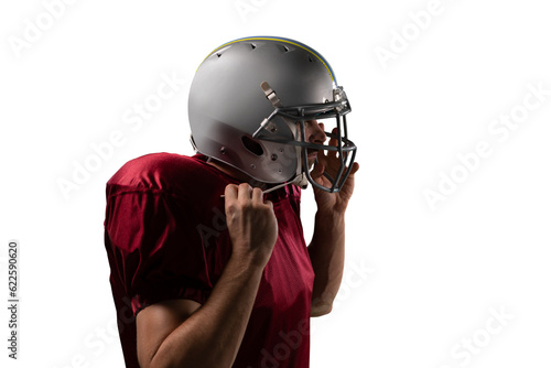 Digital png photo of caucasian male american football player with helmet on transparent background