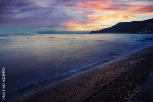 Dusk and dawn landscape. Beautiful Crimean sea bay at evening time.