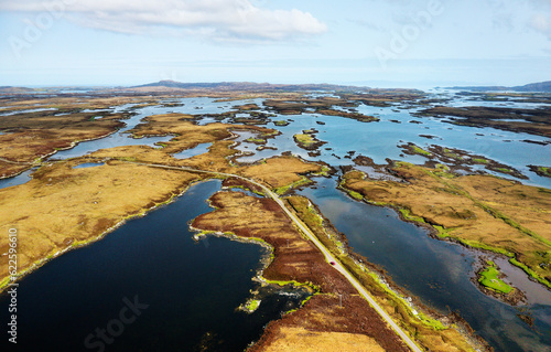North Uist, Outer Hebrides, Scotland. East over scattered islands of tidal Loch Maddy toward Crogearraidh mountain from Loch an Duin. Aerial