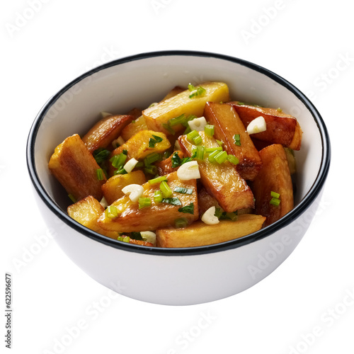 French fries close-up in a bowl with garlic and herbs