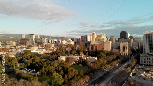 ADELAIDE, AUSTRALIA - SEPTEMBER 16, 2018: Going up in the sky with Adelaide sunset skyline. This is the main city of South Australia photo
