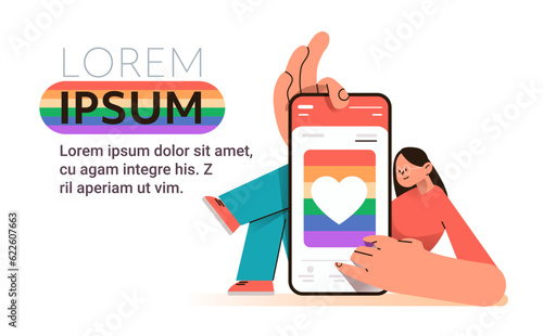 woman using smartphone with lgbt rainbow flag on screen gay lesbian love parade pride festival transgender love concept