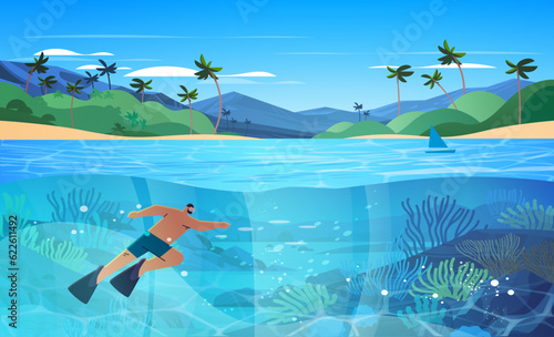tourist man swimming in sea or ocean and watching marine fauna with fish and coral reef underwater recreational