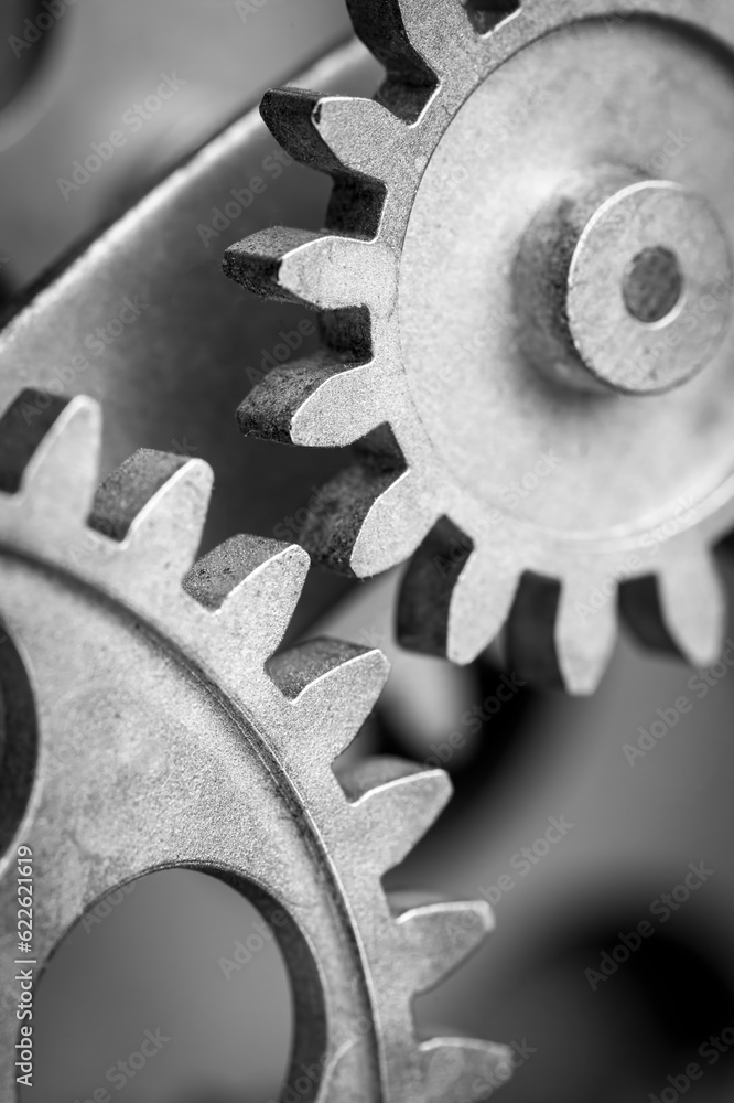 Close view of old clock mechanism with gears and cogs. Conceptual photo for your successful business design. Copy space included. Close view of old clock mechanism with gears and cogs. Conceptual photo for your successful business design. Copy space included.