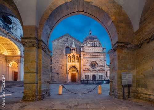 View of Bergamo Cathedral through the arch at dusk in Bergamo, Italy