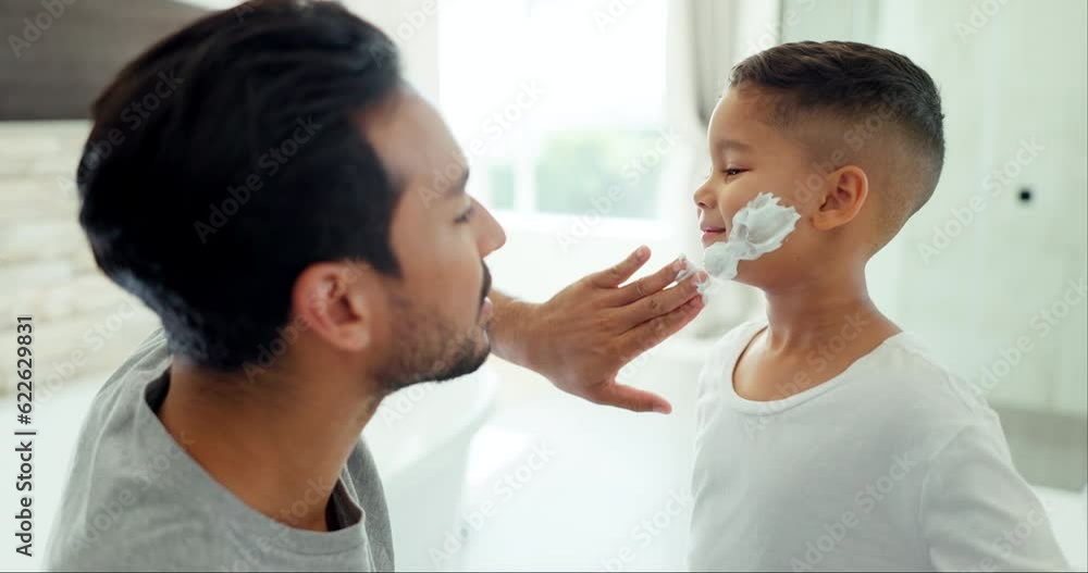 Morning, foam and father with son in bathroom for grooming, beauty and shaving cream. Skincare, love and happy with man and helping child in family home for shave, learning and cleaning together Morning, foam and father with son in bathroom for grooming, beauty and shaving cream. Skincare, love and happy with man and helping child in family home for shave, learning and cleaning together