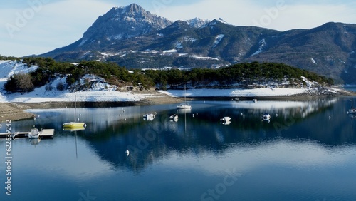  Winter Serenity  A Tranquil Lake Amidst Majestic Landscapes 