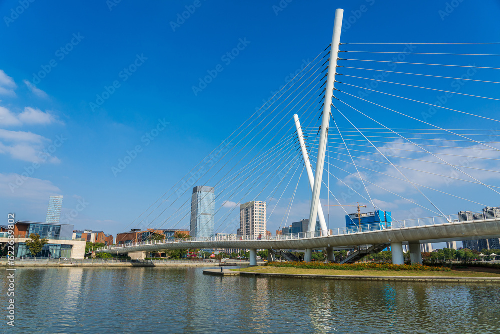 Scenic bridge in a park in Wuxi, China on a sunny day Scenic bridge in a park in Wuxi, China on a sunny day