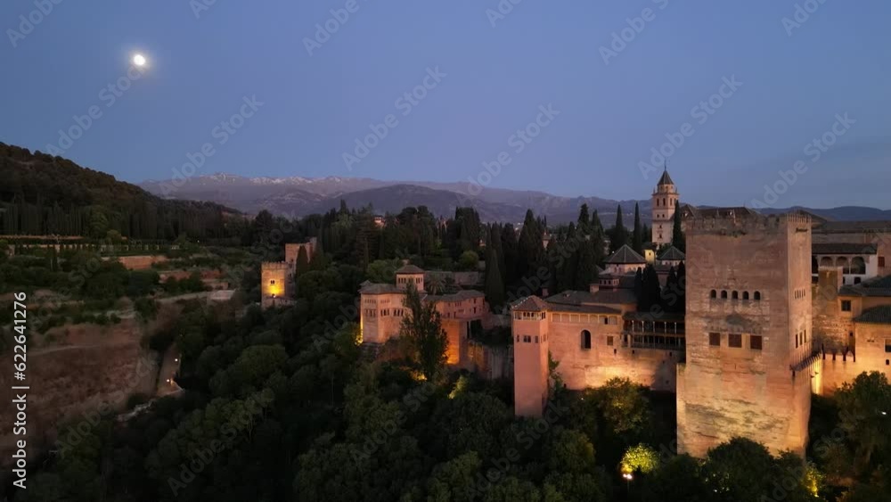 Night aerial shot of Alhambra, a palace and fortress complex in Granada, Spain Night aerial shot of Alhambra, a palace and fortress complex in Granada, Spain