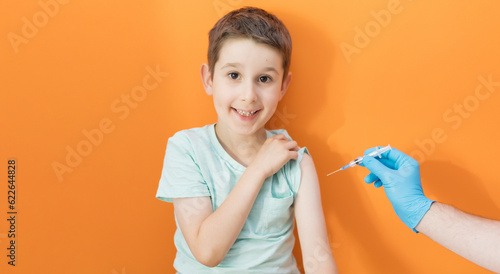 Vaccination concept on orange background