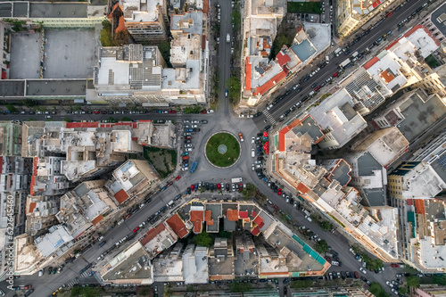Aerial view of vehicles driving a roundabout in Thessaloniki downtown, Greece. photo