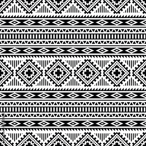 Geometric abstract shapes with ethnic style. Seamless tribal pattern. Textile print traditional design in Native American style. Black and white colors.
