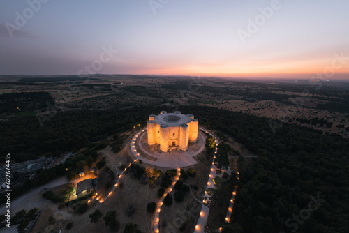 Panoramic aerial view of Castel del Monte at night, Puglia, Italy.